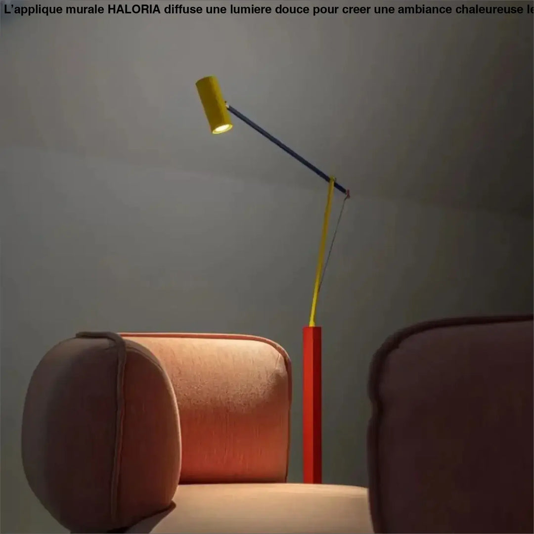 Lampadaire kineo avec lampe cylindrique jaune, bras articulé bleu et base rouge, idéal pour chambre à coucher