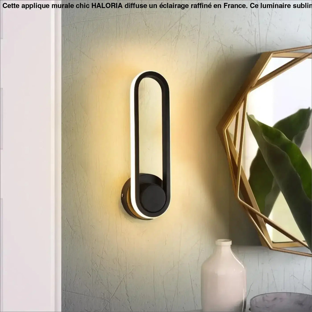 Applique murale chic haloria en led noire et blanche avec design ovale allongé moderne pour éclairage mural élégant