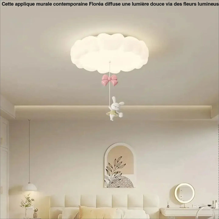 Luminaire plafonnier blanc en forme de nuage avec un noeud rose et une peluche lapin pour salle à manger