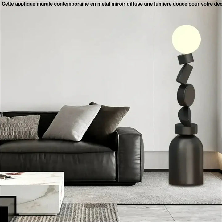 Lampadaire noir géométrique totex avec formes circulaires et rectangulaires empilées et ampoule sphérique lumineuse detail decorate root