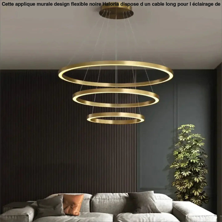Modern applique murale design en or avec triple anneau led et câble long pour un éclairage minimaliste haloria