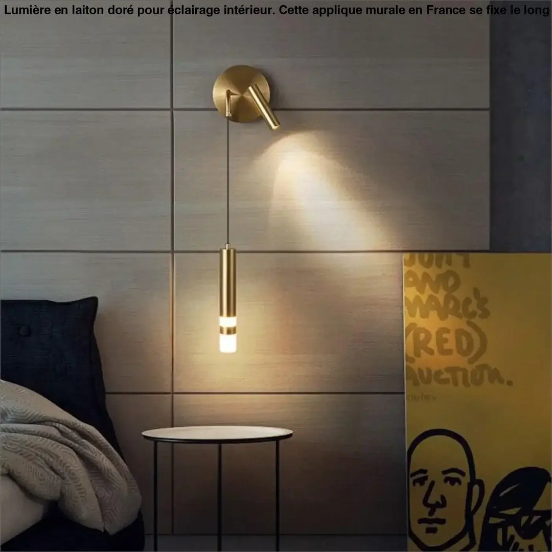 Applique murale en laiton aurelia avec suspension cylindrique dorée idéale pour long d’un couloir ou autour d’un miroir