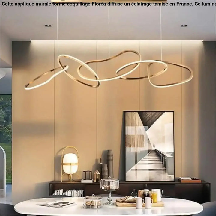 Applique murale forme coquillage floréa en métal doré avec design circulaire entrelacé moderne