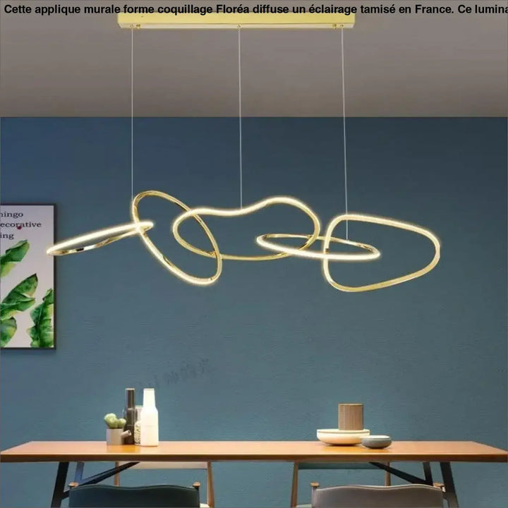 Applique murale forme coquillage floréa en led moderne ton or avec anneaux circulaires entrelacés suspendus par cordons fins