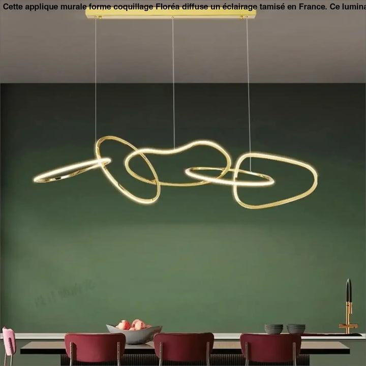 Applique murale forme coquillage floréa en led moderne ton or avec anneaux lumineux entrelacés suspendus au plafond