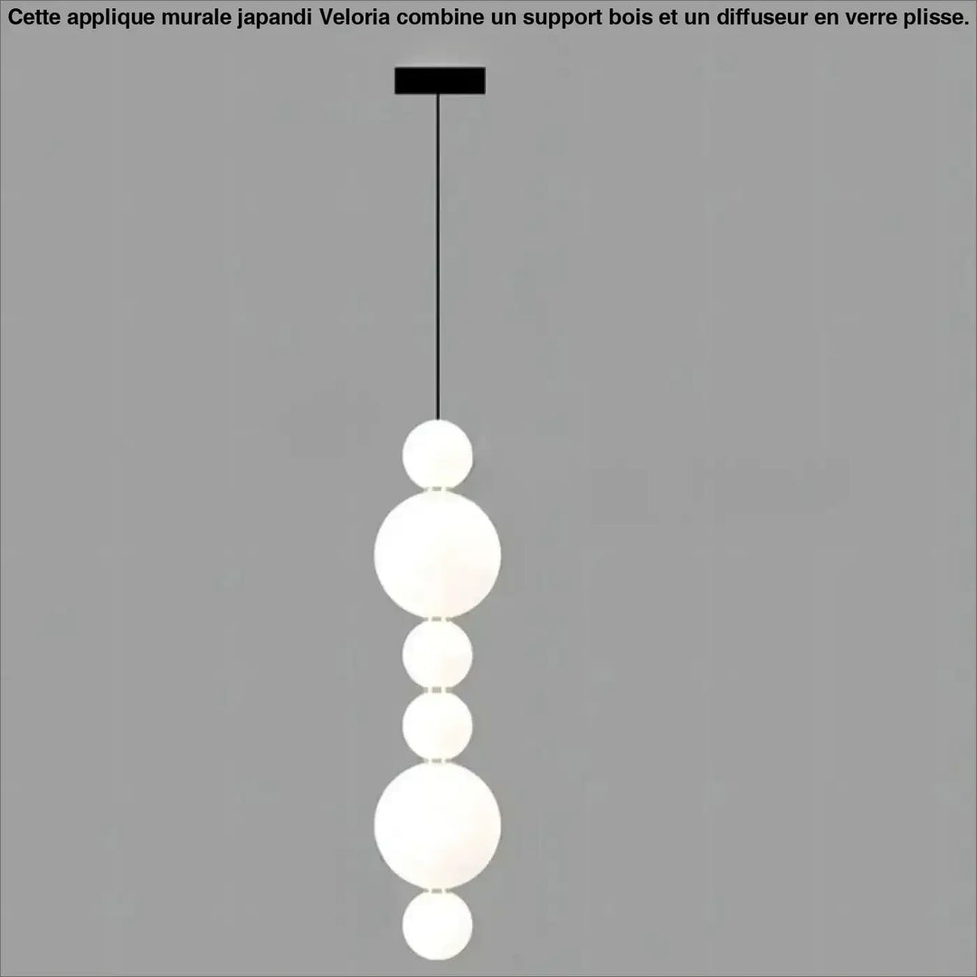 Suspension luminaire oxyo avec boules opalines blanches modernes et chute verticale noire élégante au plafond