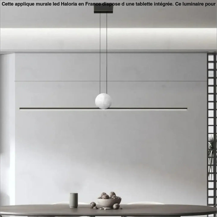 Suspension luminaire linire avec globe sphérique blanc mat suspendu par cordons noirs et fixation rectangulaire au plafond
