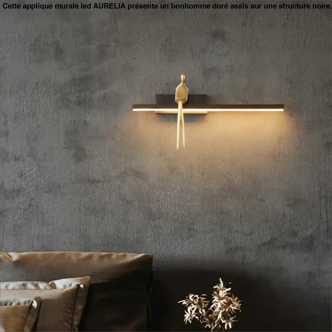 Applique Murale LED Avec Un Bonhomme Doré Assis