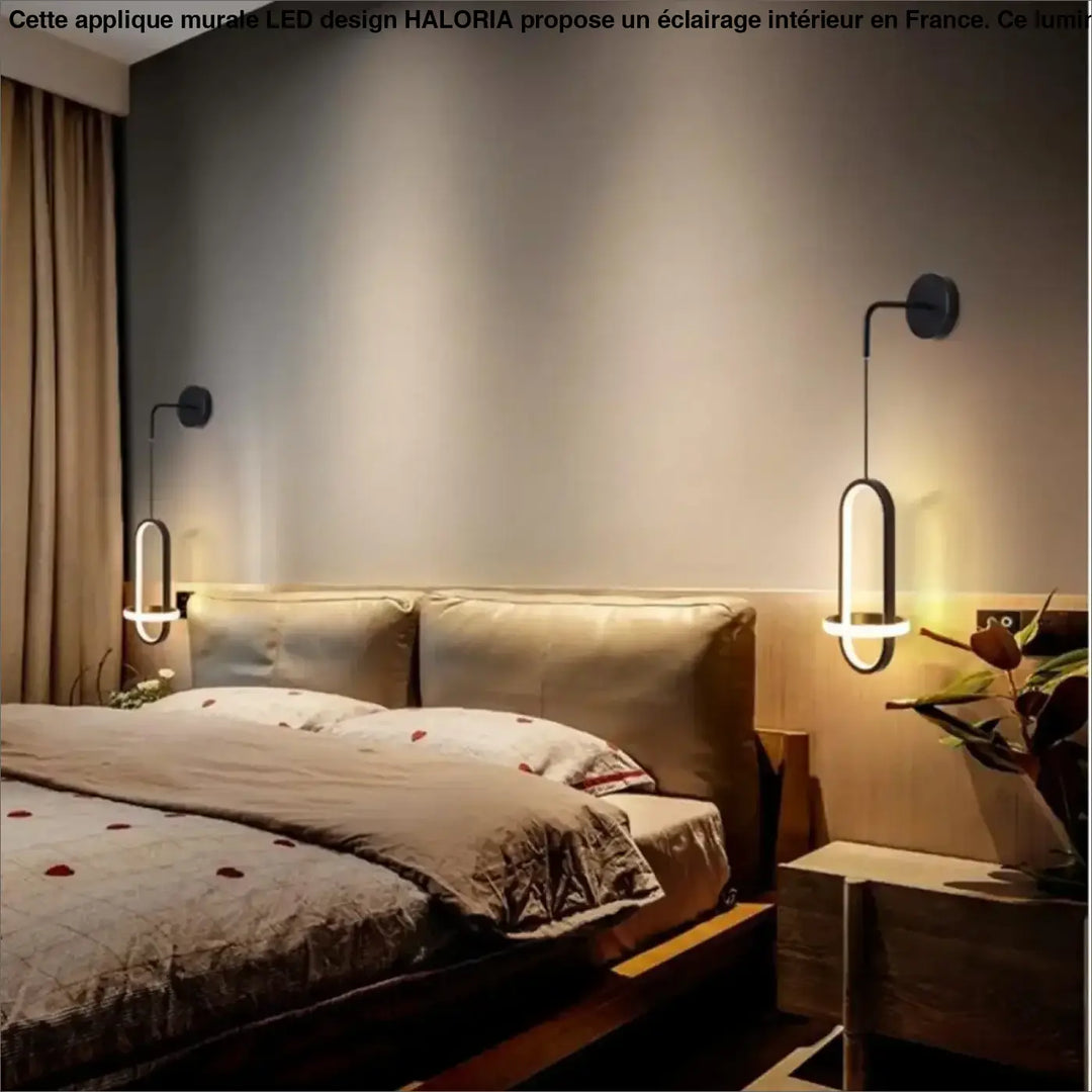 Applique murale led noire moderne haloria avec un design ovale allongé émettant une lumière chaude élégante