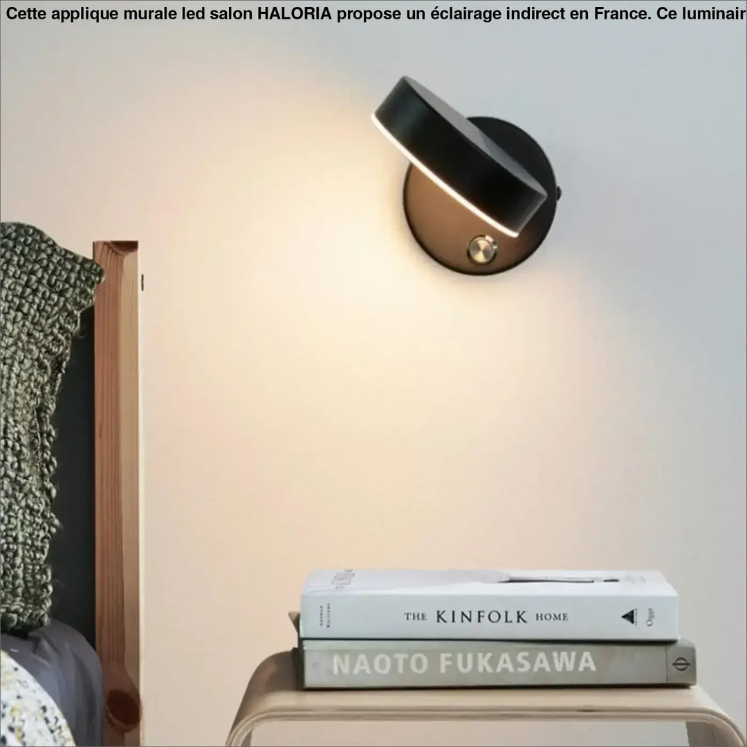 Applique murale led salon haloria noire et laiton avec design circulaire moderne et éclairage intégré