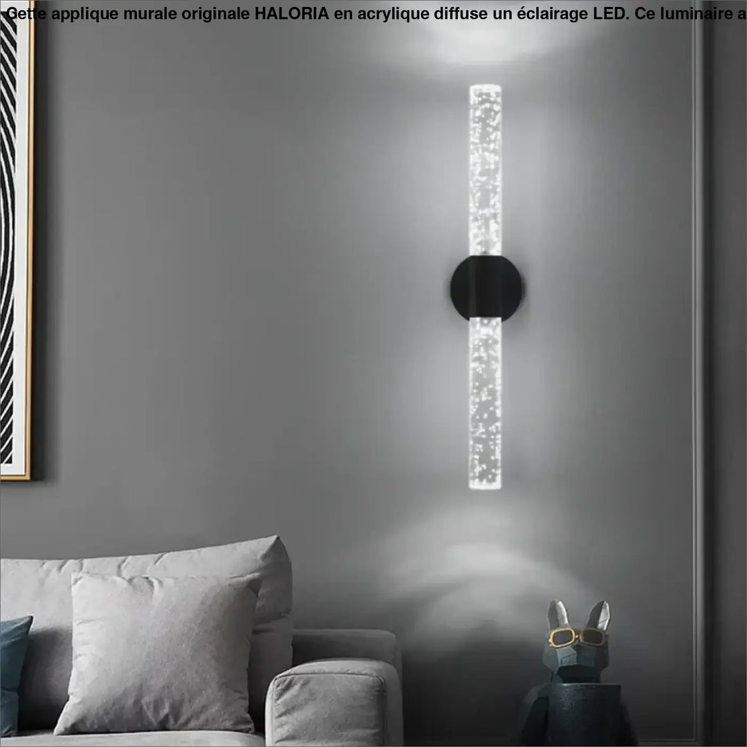 Applique murale originale haloria avec base noire circulaire et tube acrylique transparent rempli de leds étincelantes