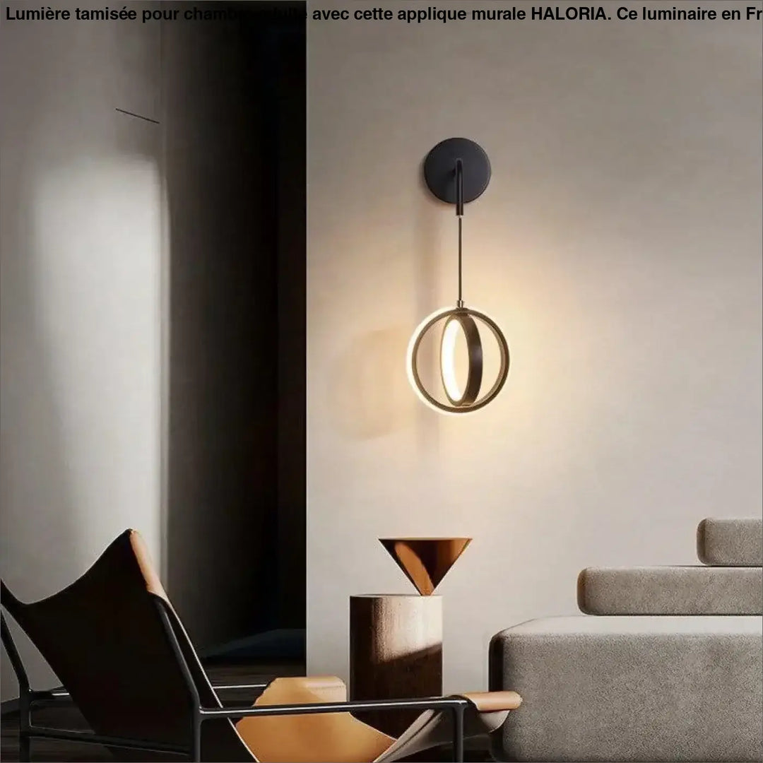 Applique murale chambre adulte noire moderne avec anneau doré lumineux design circulaire haloria