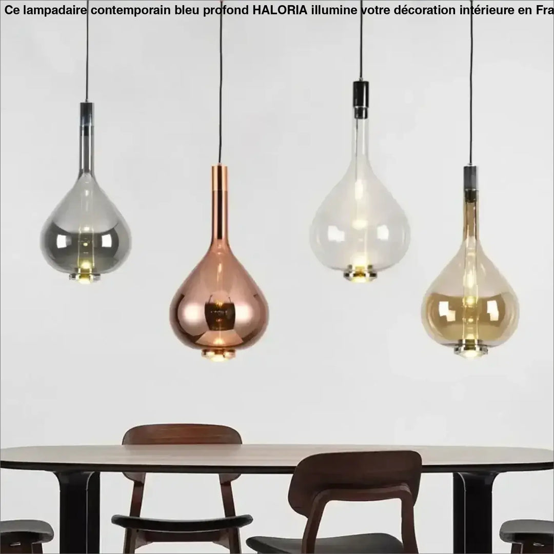 Quatre suspension luminaire elys en verre soufflé teardrop effet fumé avec finitions métalliques variées suspendues par câbles noirs