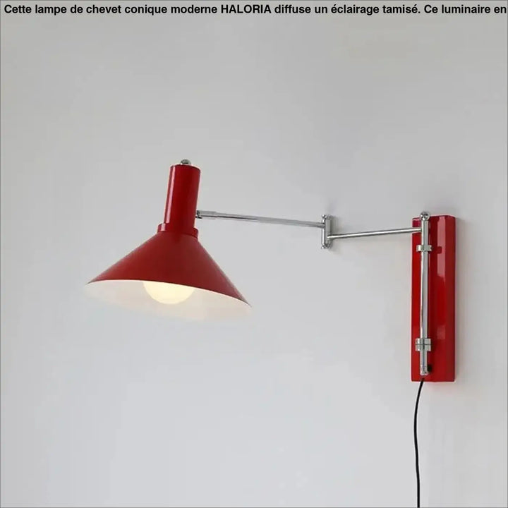Applique murale rouge avec bras articulé métallique et base rectangulaire design pour éclairage mural studio