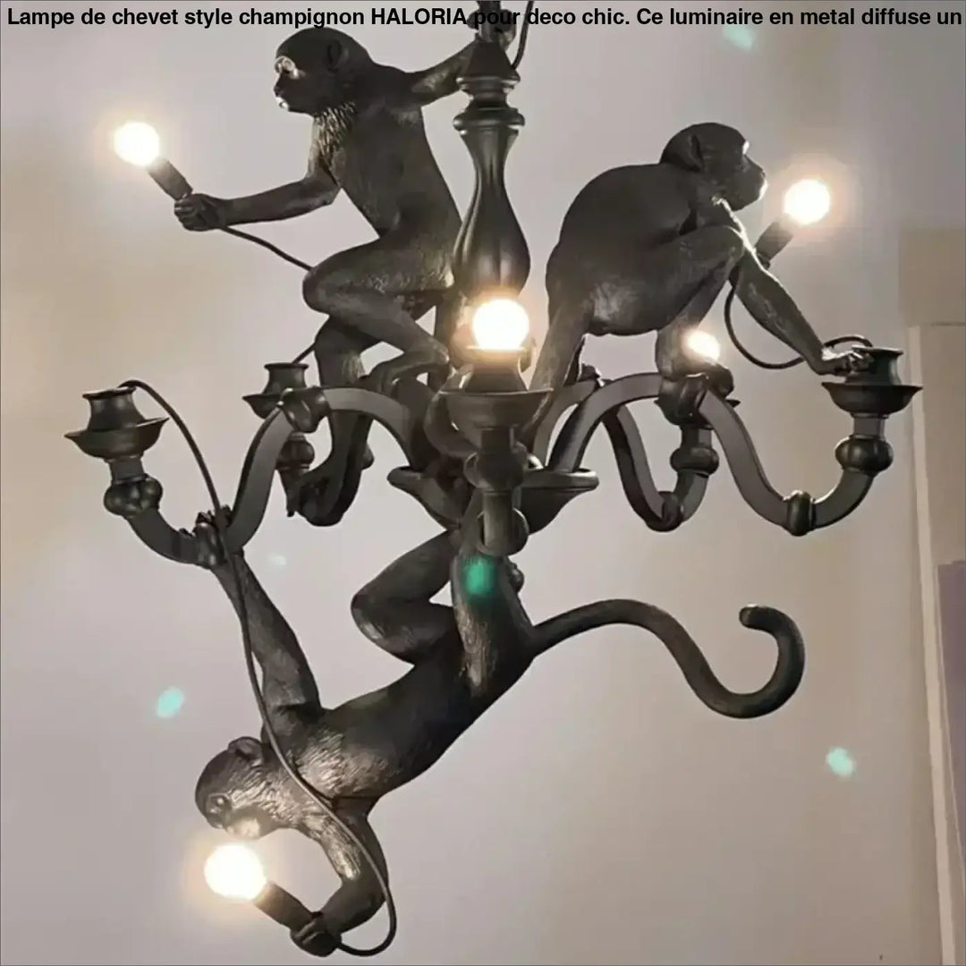 Lustre contemporaine noir avec singes sculptés en poses dynamiques tenant des ampoules pour une allure animée