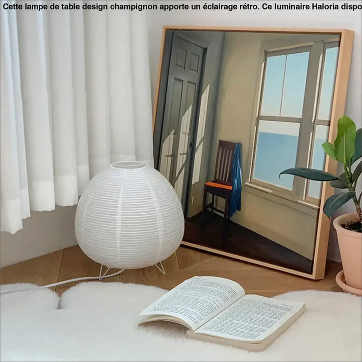 Lampe de table cathia blanche en papier avec design sphérique nervuré et pieds métalliques fine pour décoration intérieure
