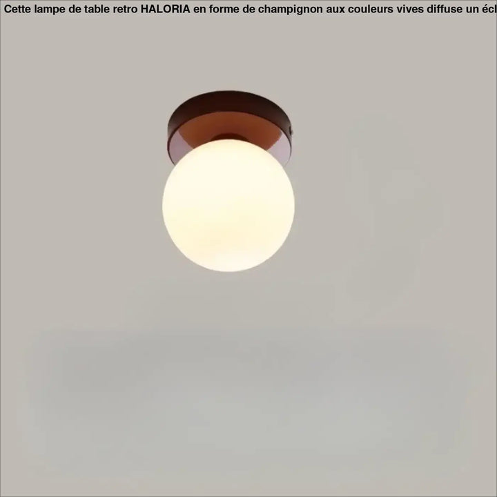 Applique murale puffo avec globe en verre chaud et base en métal bronze pour un abat-jours arrondis design doux