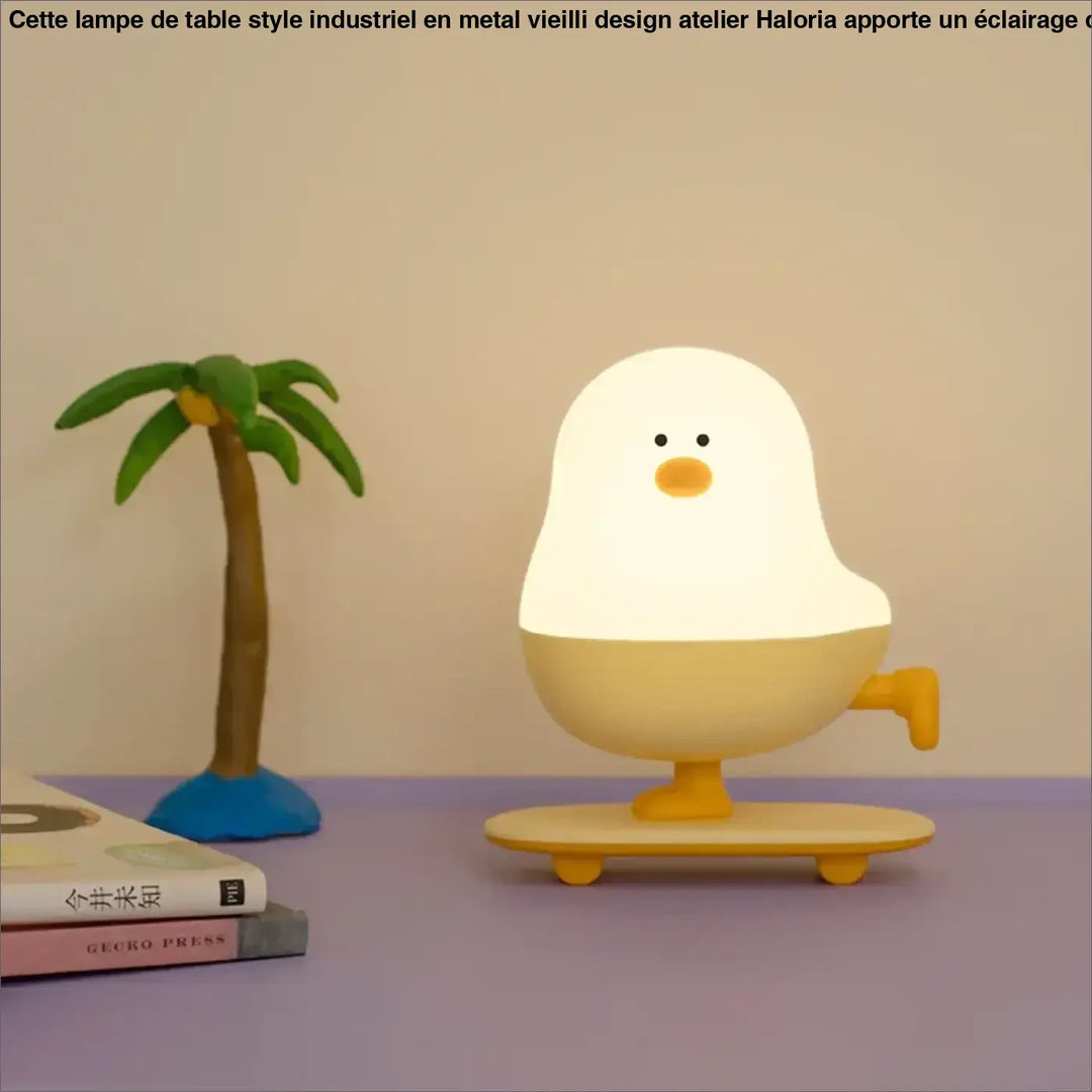Veilleuse led douce en forme de canard blanc et jaune avec base skateboard coquille d’œuf design ptibou
