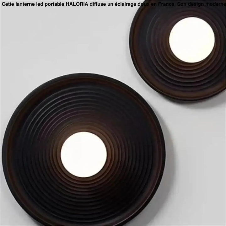 Applique murale vertigo en cercles concentriques brun foncé avec lumière douce et design élégant moderne