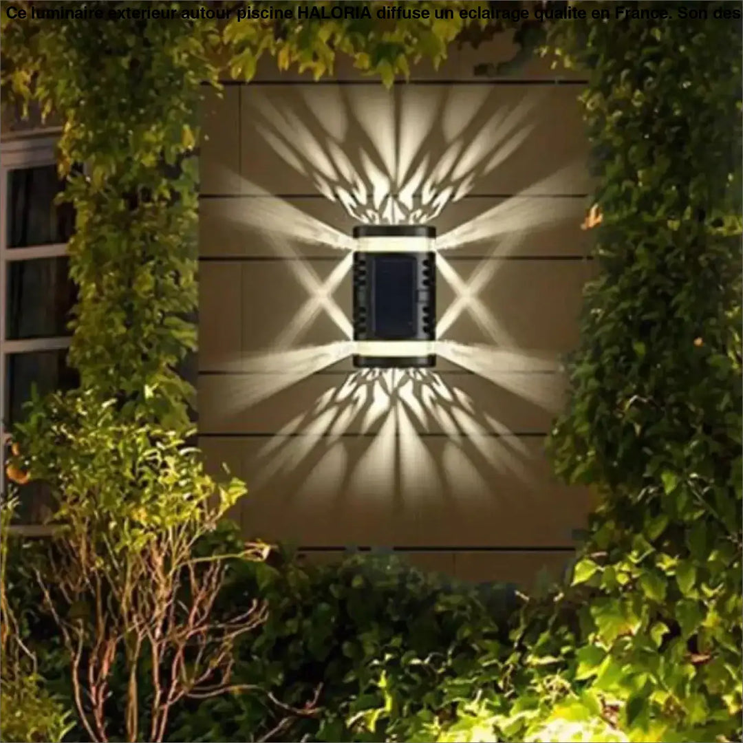 Luminaire exterieur autour piscine noir rectangulaire en metal avec motifs lumineux en etoile blanc chaud haloria