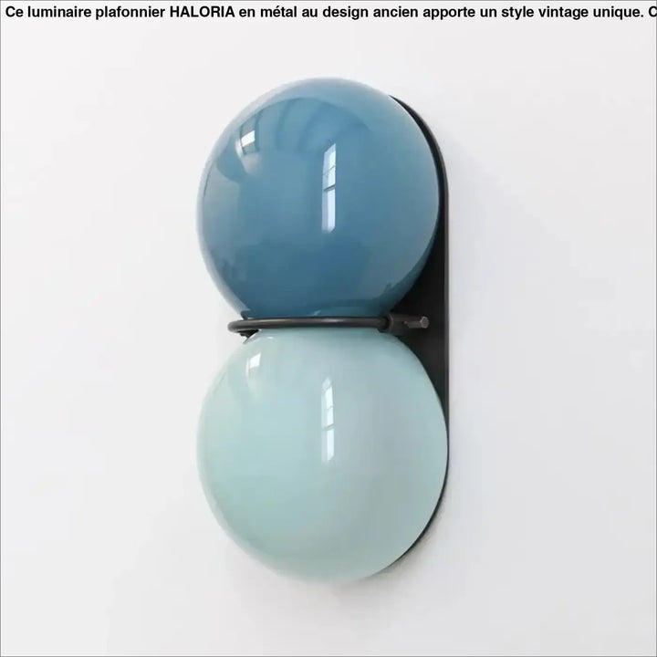 Applique murale gemini avec double boule en verre bleu et bleu clair encadrée de métal noir pour décoration intérieure