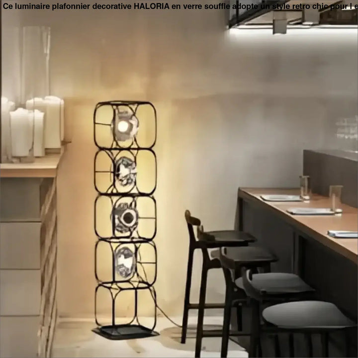 Lampadaire design vertical noir avec diffuseurs lumineux circulaires en métal esprit artistique luxora