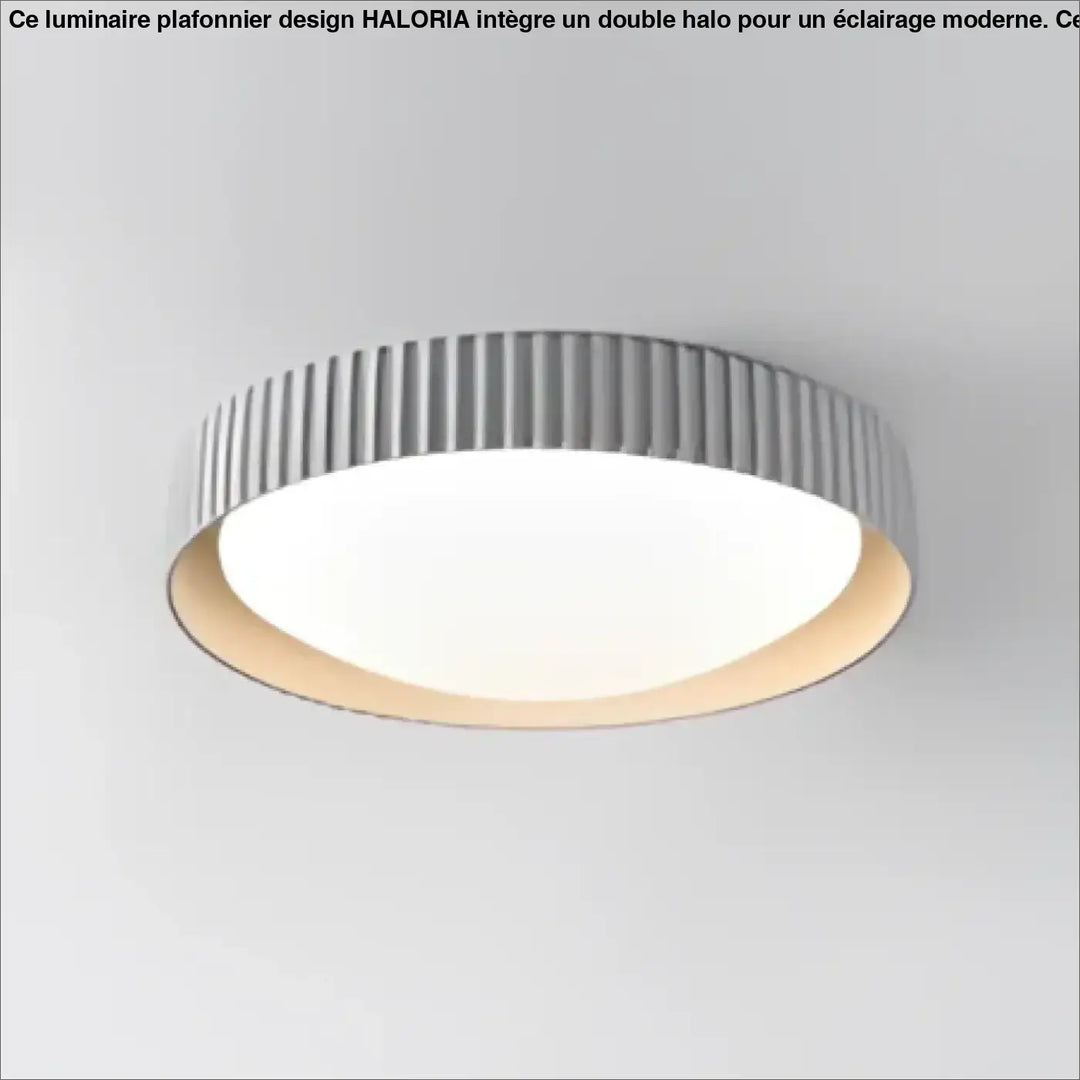 Luminaire plafonnier stria avec anneau extérieur gris cannelé et panneau intérieur éclairé blanc chaud design reliefs graphiques