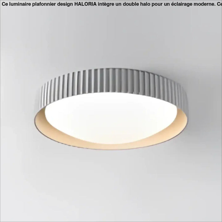 Luminaire plafonnier stria avec anneau extérieur gris cannelé et panneau intérieur éclairé blanc chaud design reliefs graphiques