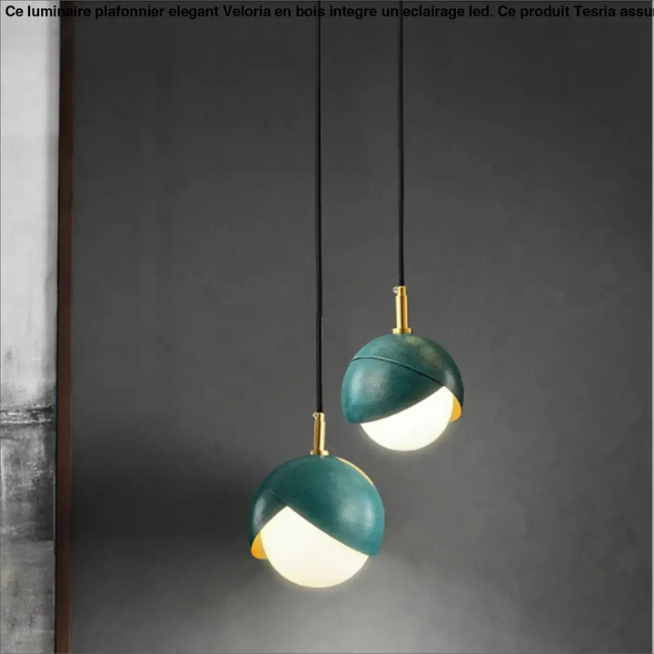 Luminaire plafonnier elegant teal en forme de demi-sphere avec accents dorés et cordons noirs par veloria