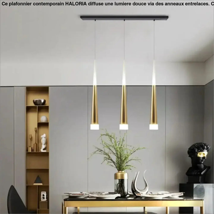 Suspension luminaire dartel avec abat-jour cylindrique effilé doré suspendu à une fixation de plafond rectangulaire noire