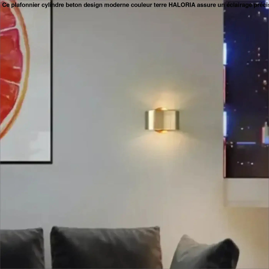 Applique murale ronde dorée au design minimaliste pour intérieur