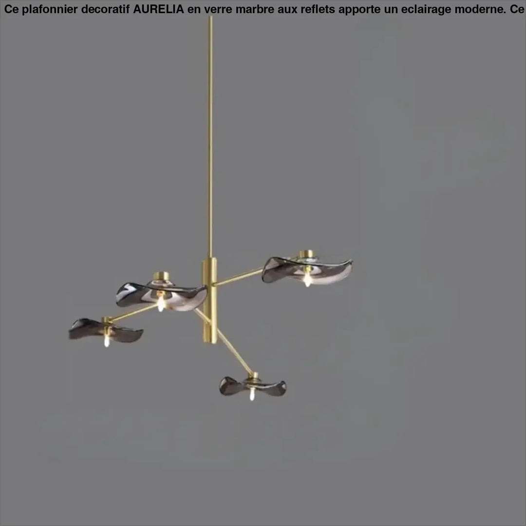 Suspension luminaire vetros en laiton finition moderne avec quatre abat-jours en verre fumé foncé sculptural