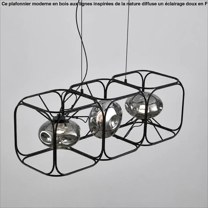 Suspension luminaire hexora noir en métal avec trois globes en verre miroir sphériques structure alvéolaire moderne