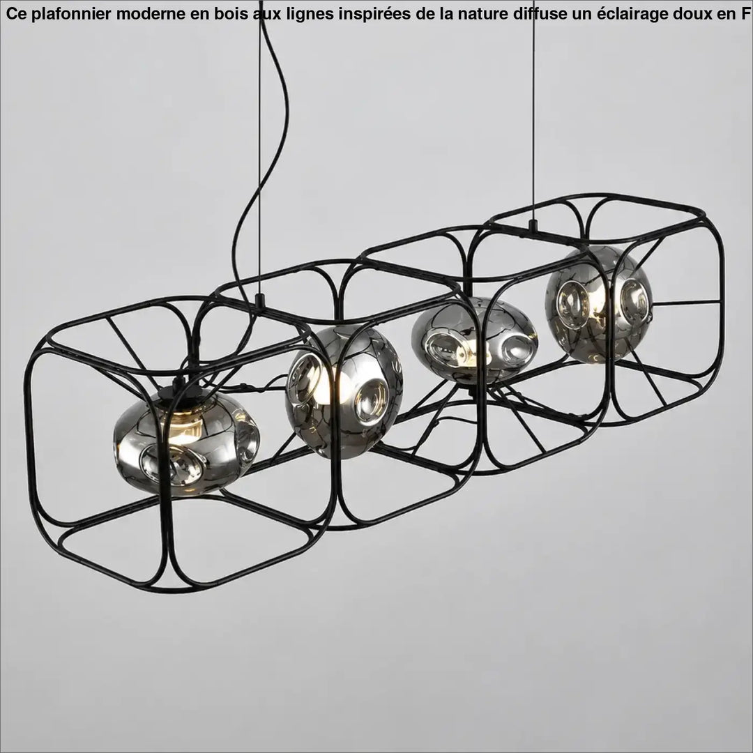 Suspension luminaire hexora en métal noir avec quatre globes en verre chromé reflétant un design moderne structure alvéolaire