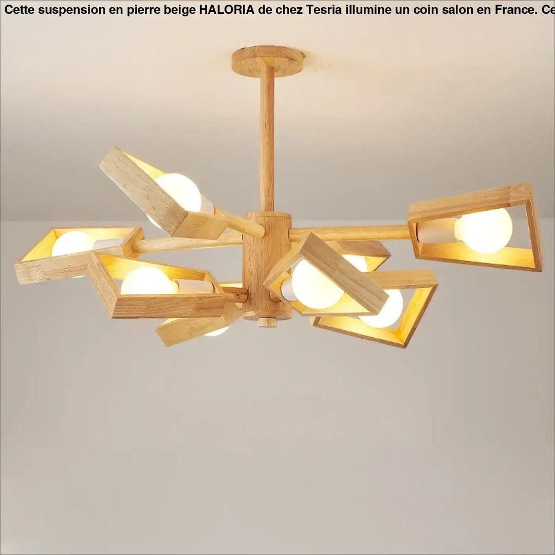 Suspension design en pierre beige avec bras géométriques en bois et ampoules sphériques chaudes au-dessus d’une table