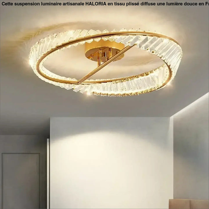 Luminaire plafonnier atlys design circulaire moderne avec cadre métal doré et anneaux concentriques ornés de cristaux facettés