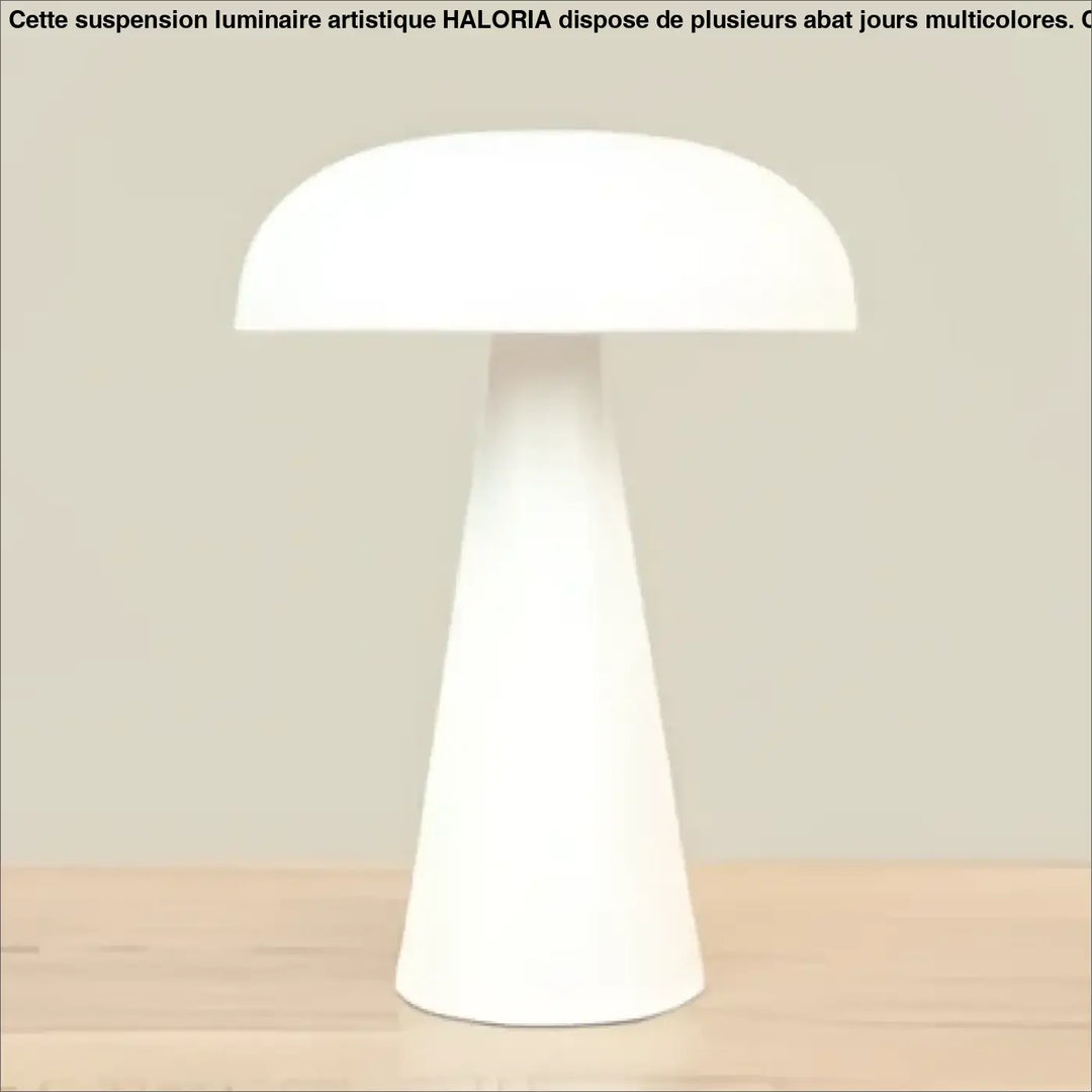 Lampe de table amelia en céramique blanche avec abat-jour arrondi lisse et base effilée pour salle à manger design