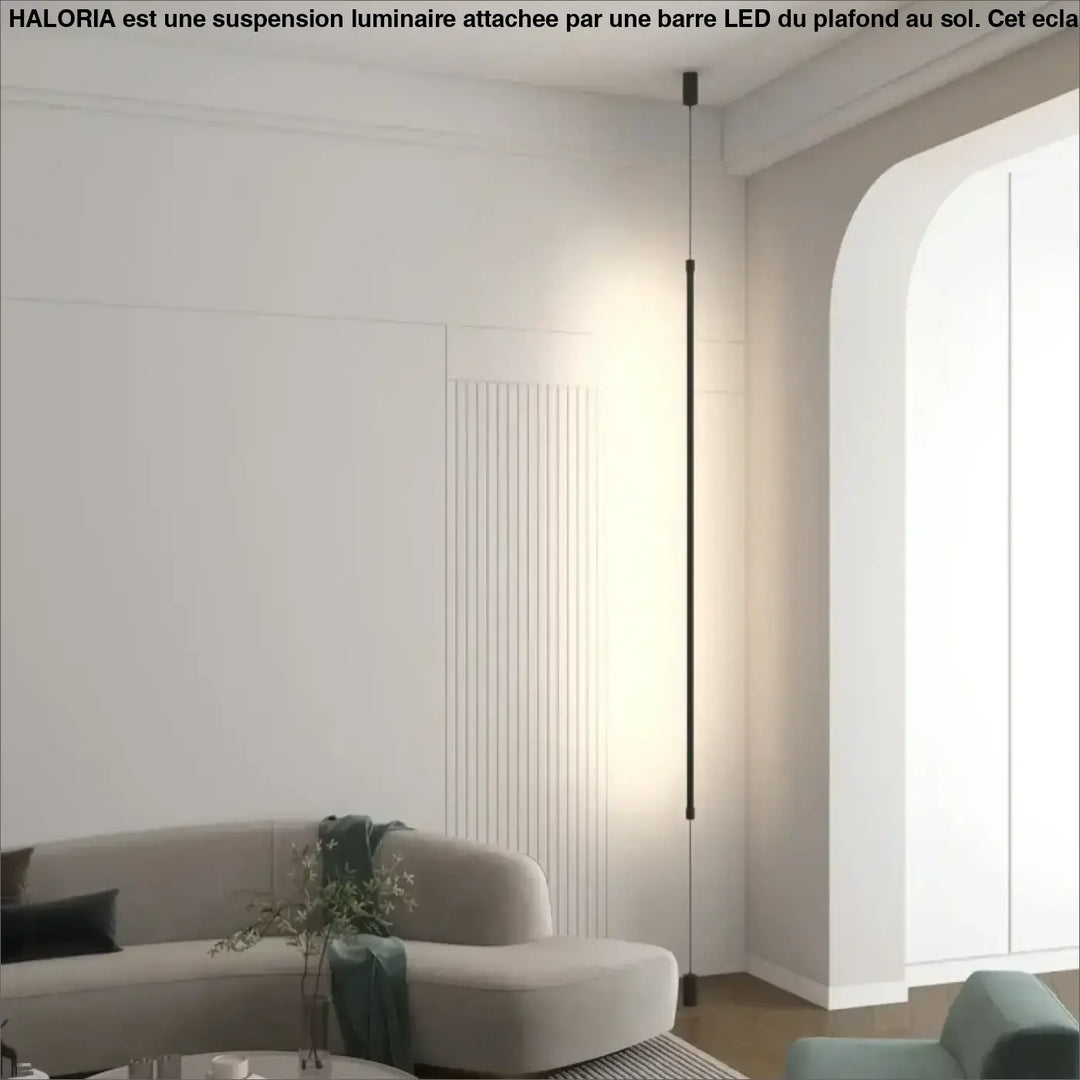Suspension luminaire attachée au plafond au sol par une barre LED

