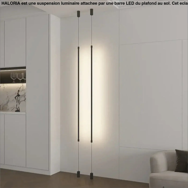 Suspension luminaire attachée au plafond au sol par une barre LED
