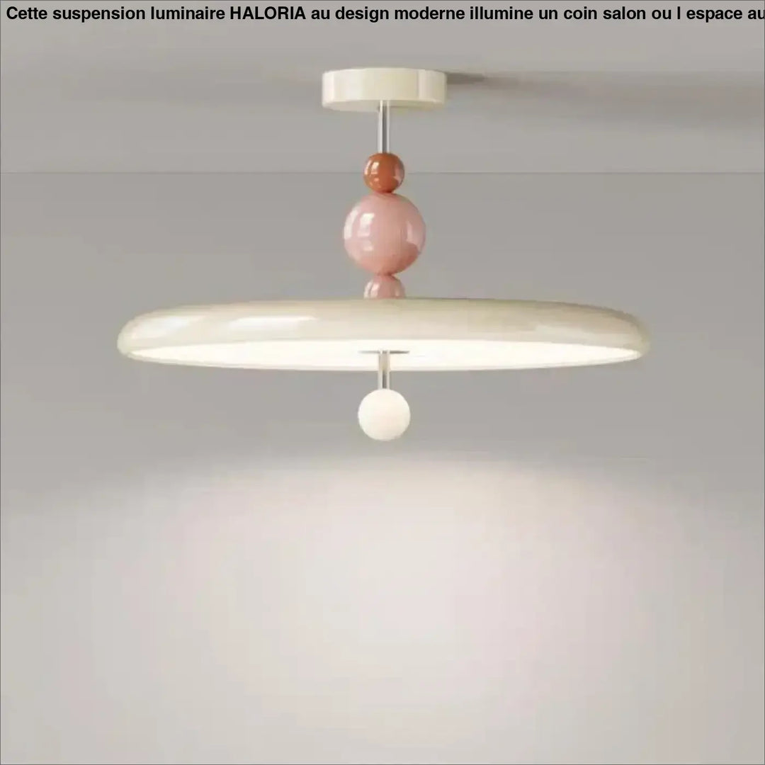 Suspension luminaire Tania en style contemporain avec accents sphériques brillants rose pastel et crème pour ambiance douce