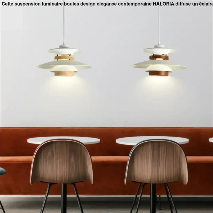 Suspension luminaire stratis en bois et blanc à design scandinave suspendue au-dessus des tables