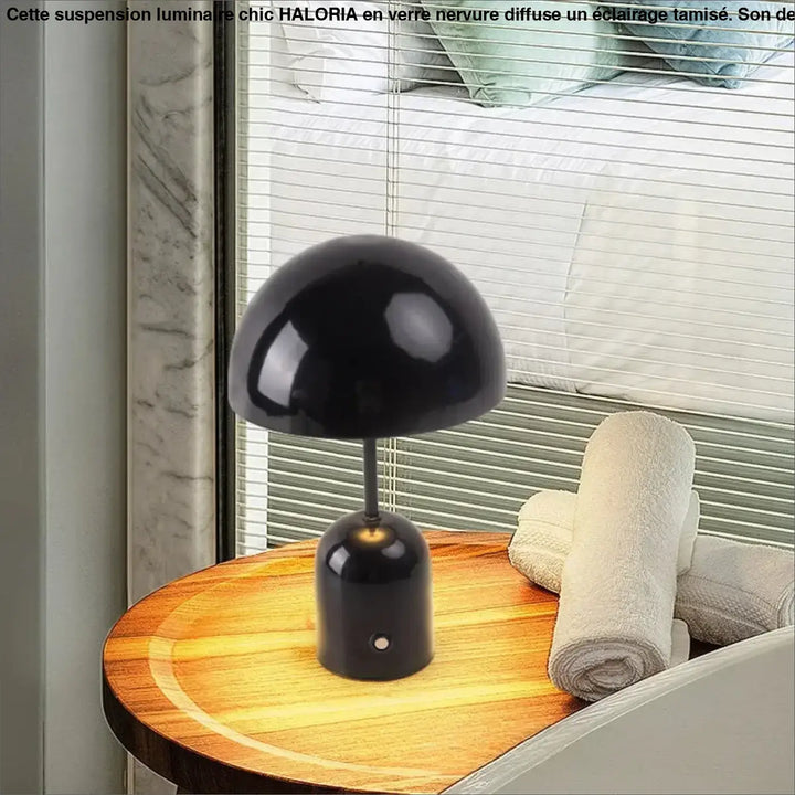 Lampe de table noire kapula au design contemporain avec finition brillante pour une présence élégante et table moderne