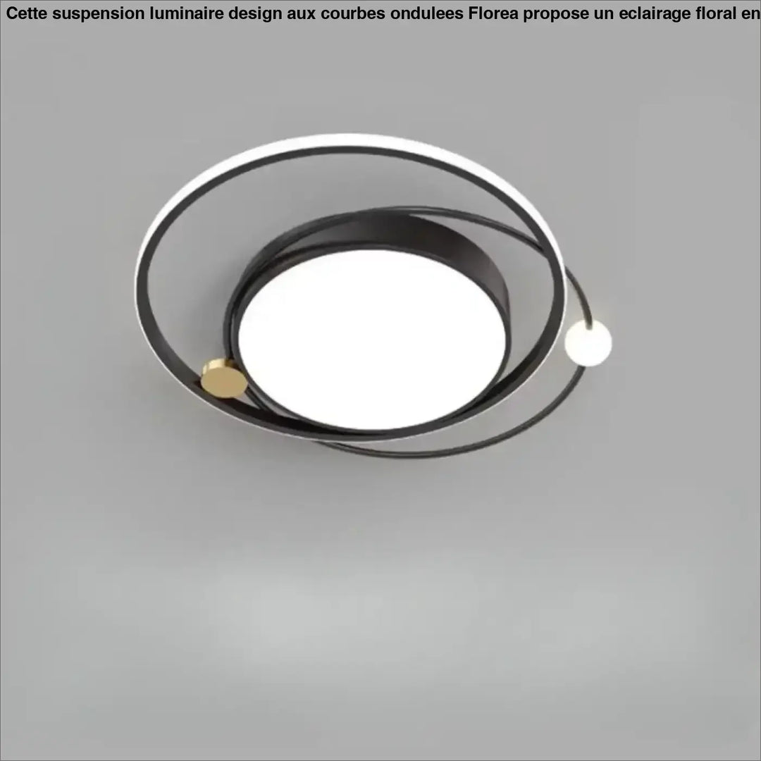 Luminaire plafonnier aloïs moderne avec design circulaire noir blanc et détails dorés pour lumière blanche ou chaude en salle à manger