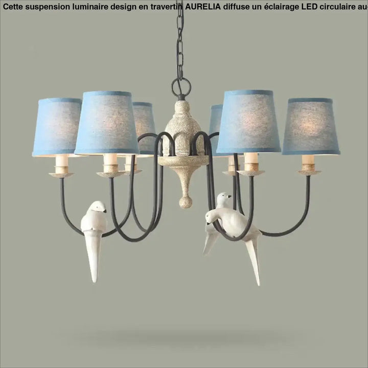 Suspension luminaire design aurelia led style travertin avec abat-jours bleu clair et oiseux en céramique au-dessus d’une table