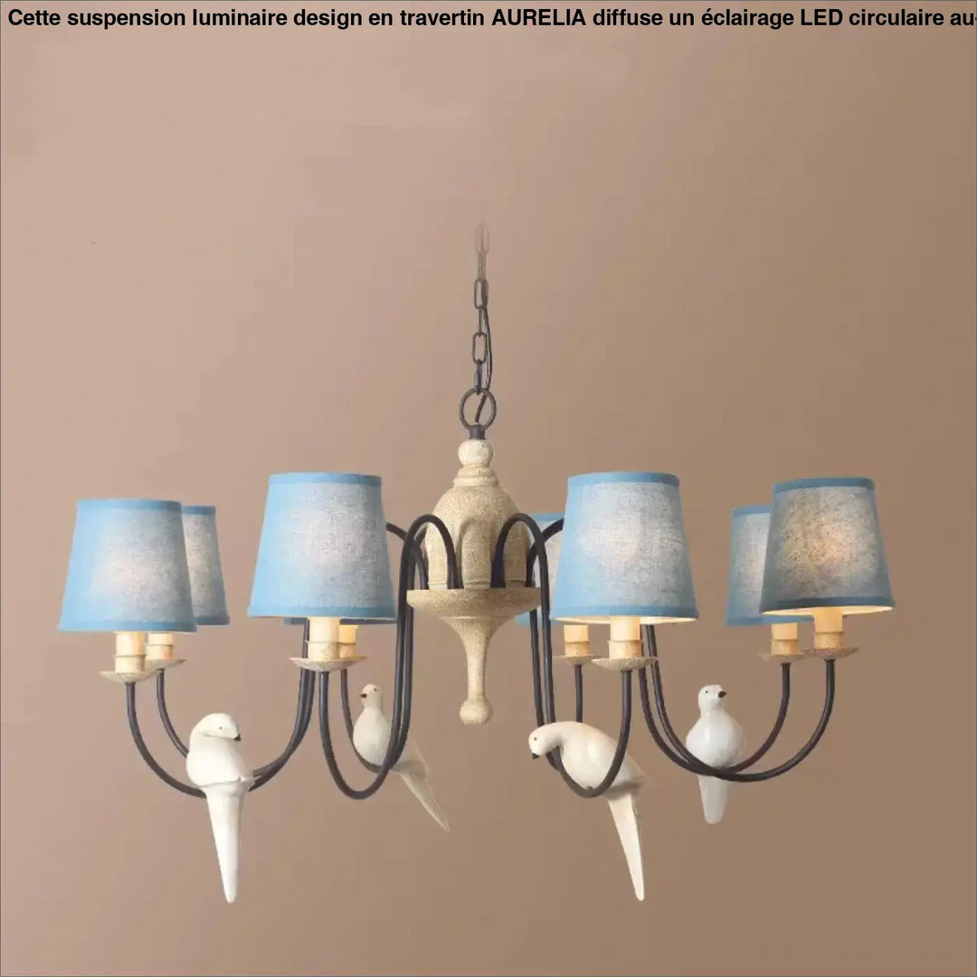 Suspension luminaire design circulaire led style travertin aurelila avec cadre métal blanc et oiseaux blancs au-dessus d’une table