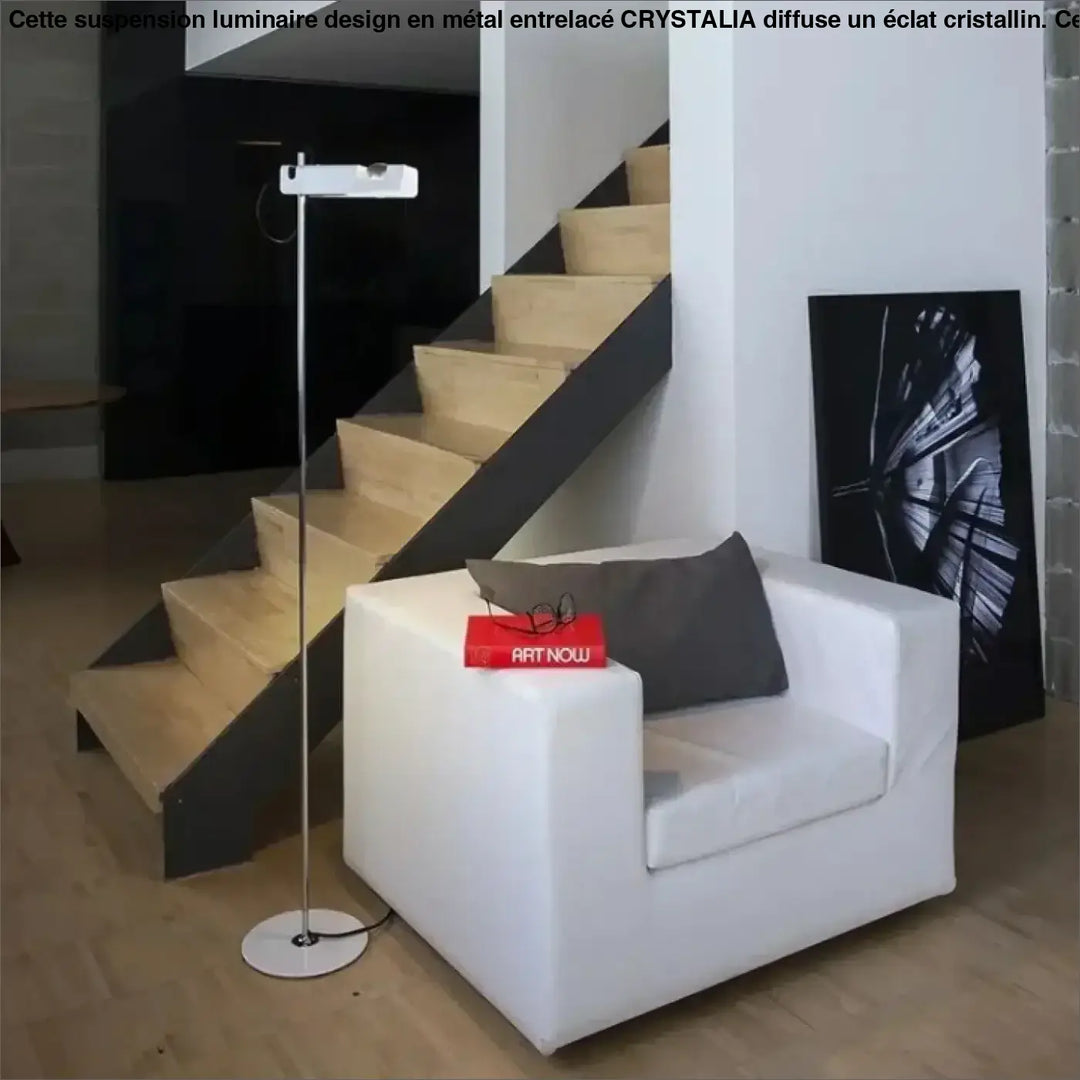 White leather armchair with gray cushion and red magazine illustrating structure fine for lampadaire moderne with éclairage directionnel
