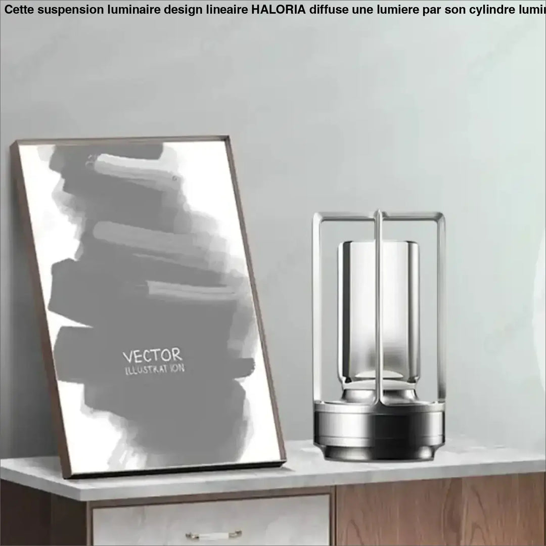 Lampe de table louane en métal argenté moderne avec centre en verre cylindrique et style lanterne pour décoration intérieure