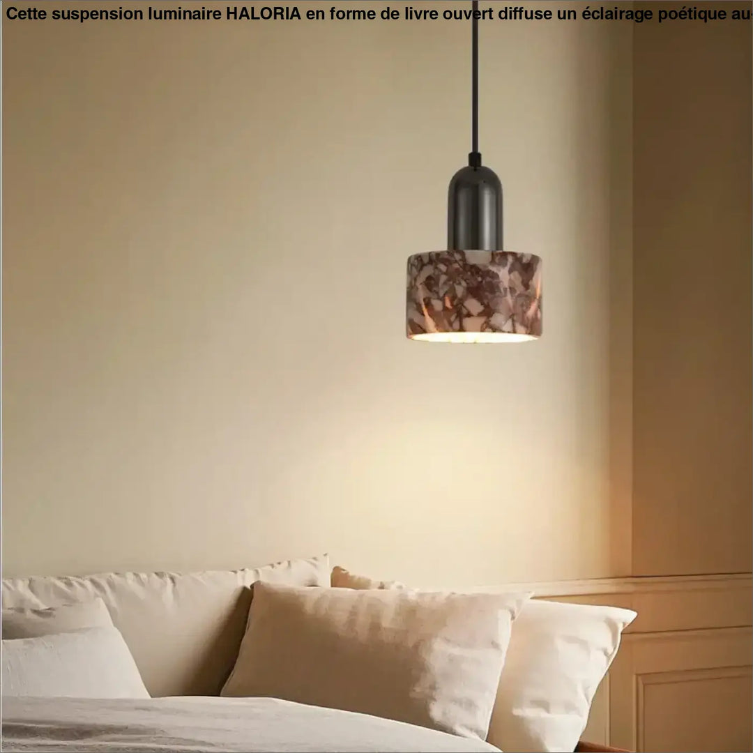 Suspension luminaire dabine métal noir avec abat-jour cylindrique en verre marbré marron et beige au-dessus d un lit