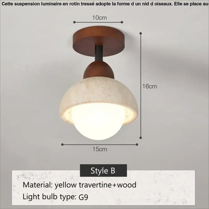 Suspension luminaire nid d oiseaux avec base en bois chaud et dôme en travertin texturé au-dessus d’une table
