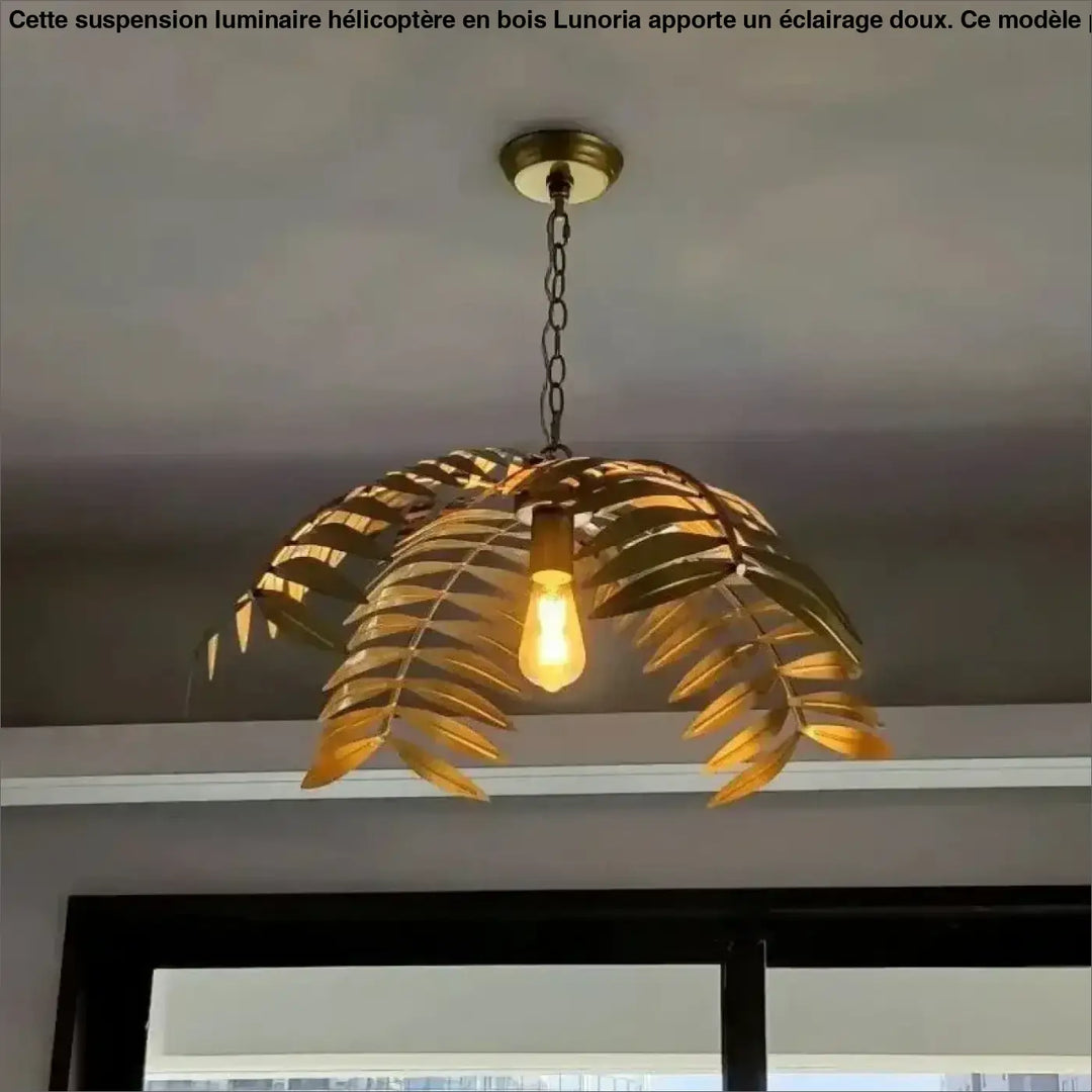 Suspension luminaire dorée au design feuillage tropical naturel